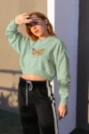 crop-top-hoodie-mockup-of-a-blonde-girl-standing-under-the-sunlight-26041 (4)